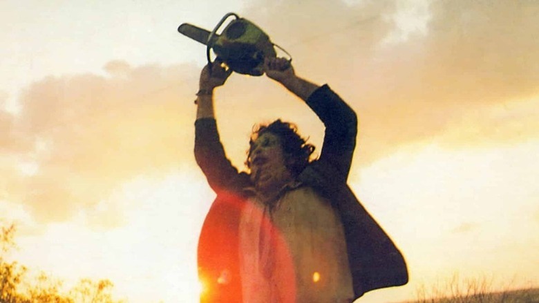 Leatherface wielding a chainsaw in "The Texas Chain Saw Massacre"
