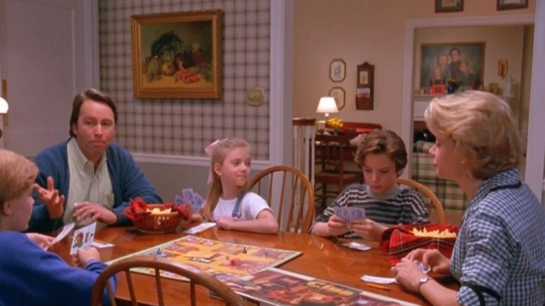 North at a game table with the Nelson family in North