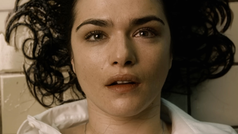 Angela lying on the ground and staring up at the ceiling in Constantine
