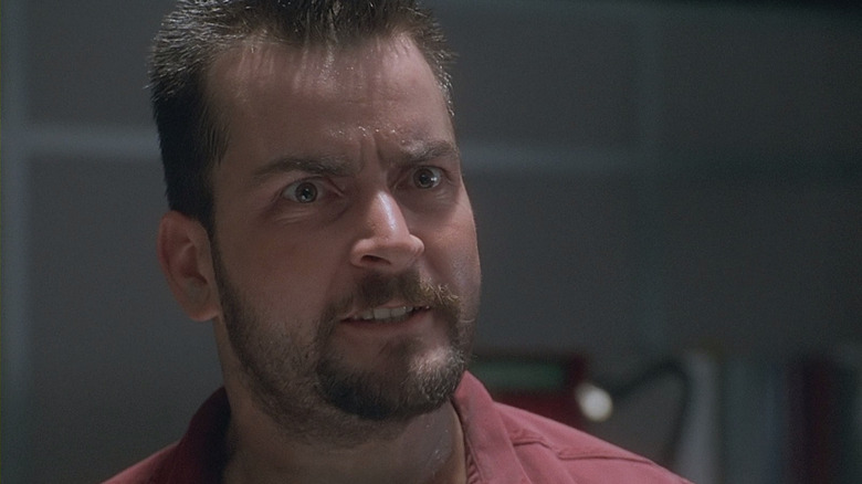 Charlie Sheen looking angry as Zane Zaminksky in The Arrival