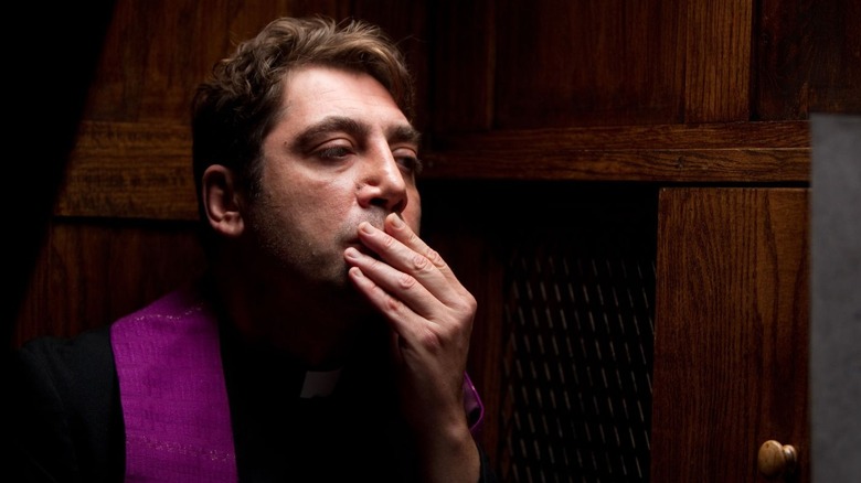 Father Quintana in a confessional in To the Wonder