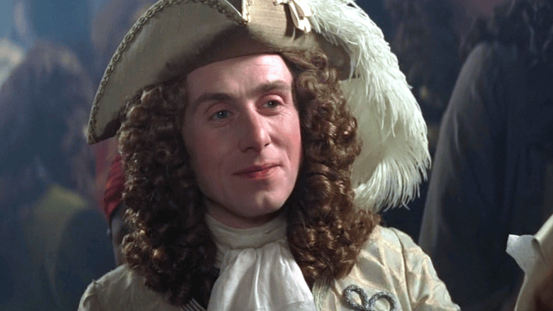 Archibald Cunningham, die vrolijk overkomt in Rob Roy