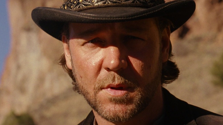 Russell Crowe as Ben Wade wearing a hat and looking serious in 3:10 to Yuma