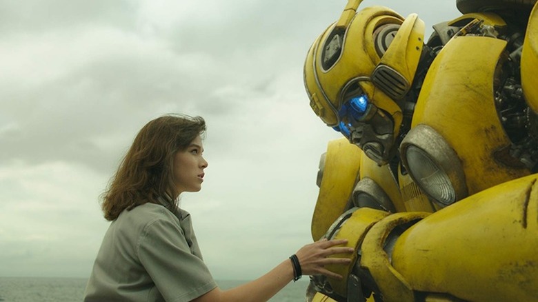 Haille Steinfeld as Charlie Watson shares a tender moment with Bumblebee in Bumblebee