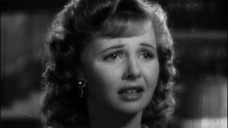 A tearful woman singing in Rick's cafe in Casablanca