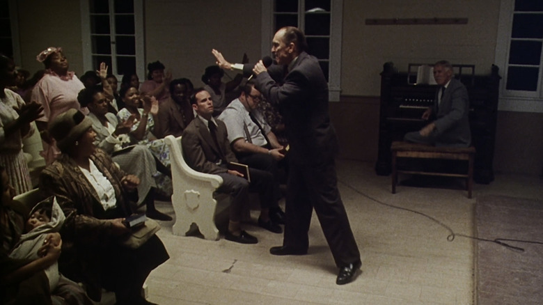 Robert Duvall's Euliss F. Sonny Dewey preaches to his congregation in a church in The Apostle
