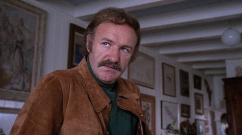 Gene Hackman giving side-eye to someone off camera as Harry Moseby in Night Moves