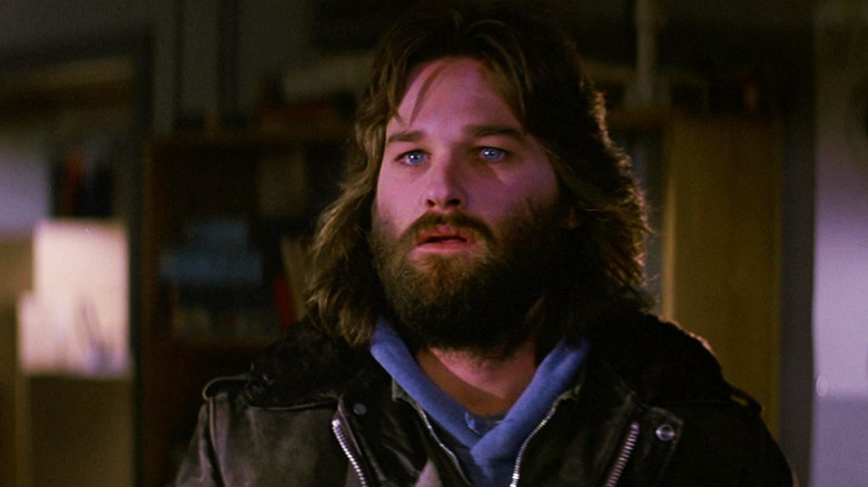 Kurt Russell's R. J. MacReady looks worried in The Thing