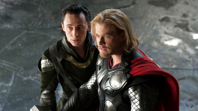 Loki and Thor stand together in Thor (2011)