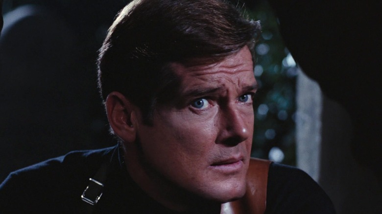 Roger Moore's James Bond looks shocked in LIve and Let Die