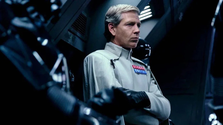 Ben Mendelsohn's Director Orson Krennic surrounded by Death Troopers in Rogue One: A Star Wars Story