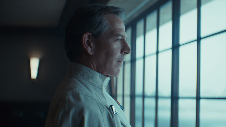 Ben Mendelsohn's Director Orson Krennic looking out of the window on Andor
