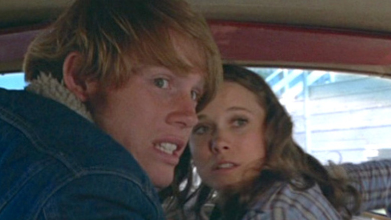 Sam and Bala are afraid in a car in a large theft car