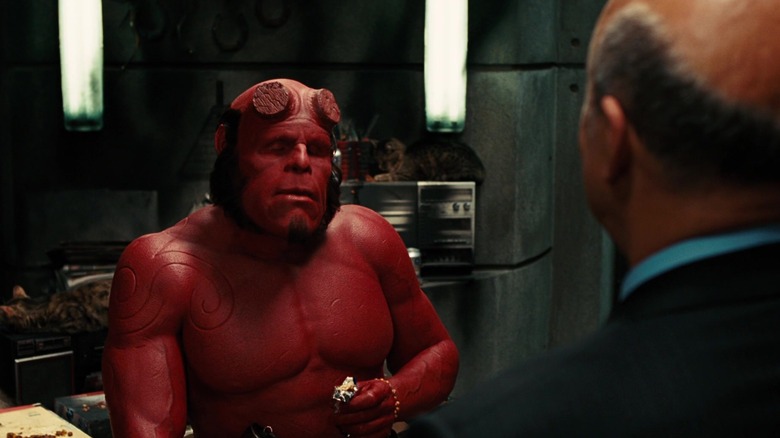 Ron Perlman's Helboy speaks to Effeefrey Tambor as Tom Manning in Helboy II: The Golden Army