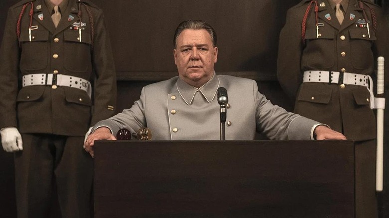 Russell Crowe as Herman Göring sitting on the stand in Nuremberg