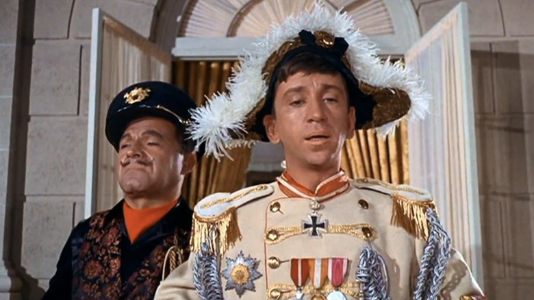 Bob Denver's Gilligan looks down from a balcony as a dictator in a dream sequence in Gilligan's Island