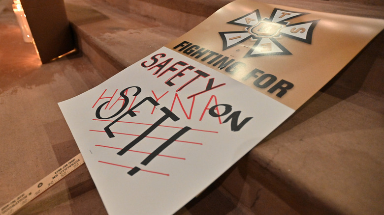 Protest sign, 'Fighting for safety on set'