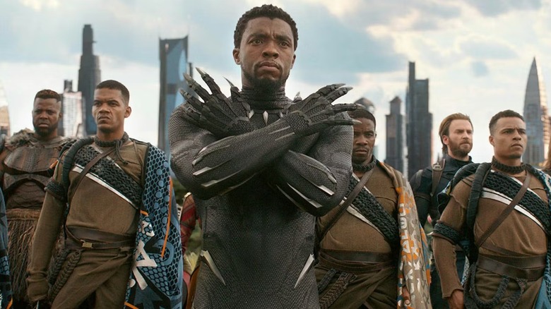 T'Challa doing the Wakanda Forever salute in front of an army in Avengers: Infinity War