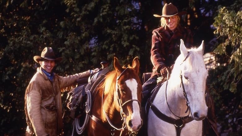 Hobson off of a horse and Gloria on one in Nothing Too Good for a Cowboy