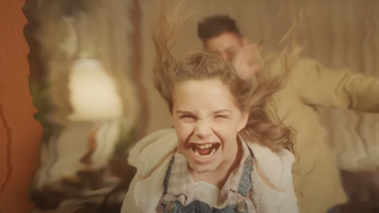 Charlie McGee (Ryan Kiera Armstrong) throws fireballs with her mind in Firestarter (2022)