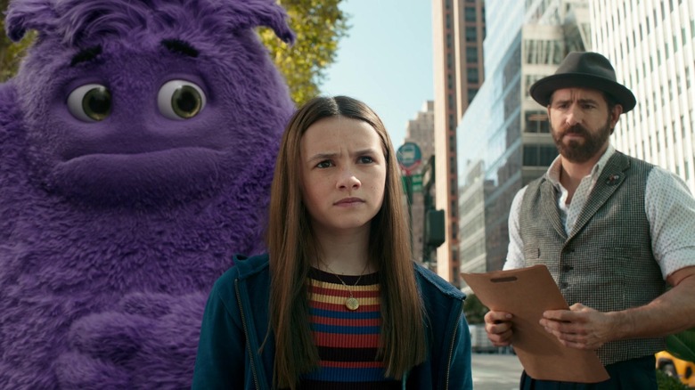 Blue, Bea, and Cal in the street in IF