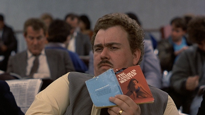 Del Griffith reading The Canadian Mounted in Planes, Trains and Automobiles
