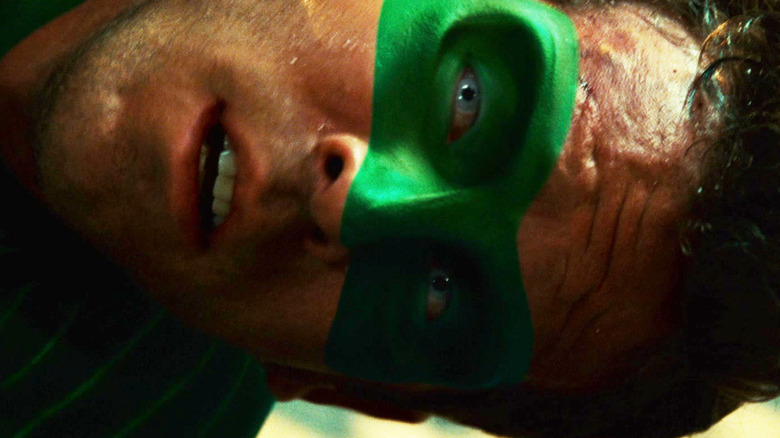 Ryan Reynolds' Hal Jordan/Green Lantern is seen in closeup as he lays on the floor in Green Lantern