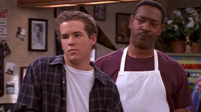 Ryan Reynolds and Julius Carry looking annoyed as Berk and Bill in Two Guys, A Girl and a Pizza Place