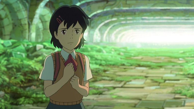 Asuna stands in an overgrown underground tunnel in Children Who Chase Lost Voices