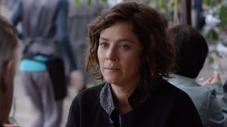 Anna Friel as Odelle Ballard speaking with tears in her eyes in American Odyssey