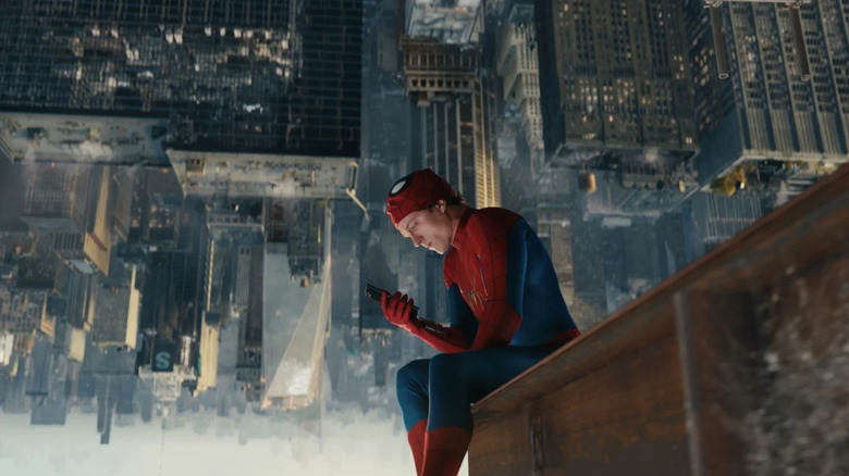 Spider-Man checks his messages in Spider-Man: Brand New Day