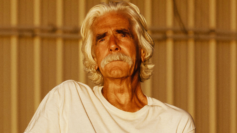 Sam Elliott's T L Norris is seen in closeup as he looks off into the distance in Landman