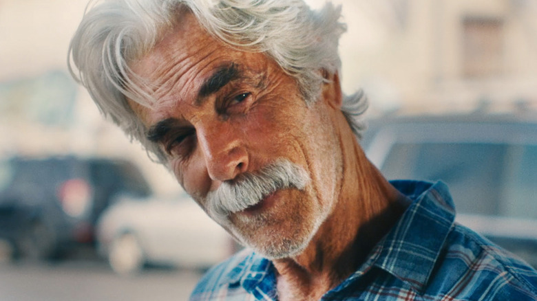 Sam Elliott's Lee Hayden smiles in closeup in The Hero