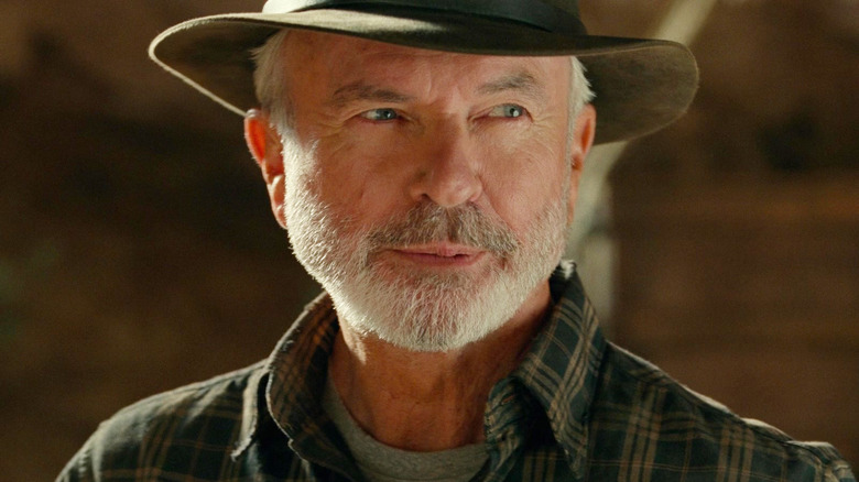 Alan Grant looks melancholic yet cool in his adventurer hat in Jurassic World Dominion