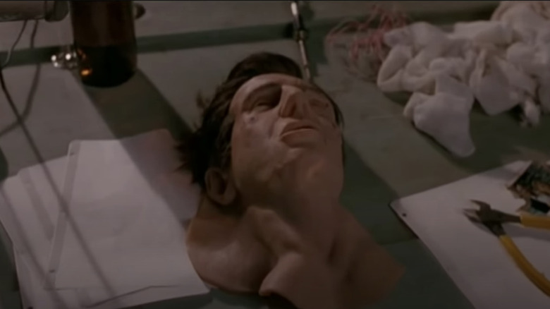 A mask of Liam Neeson's face in Darkman