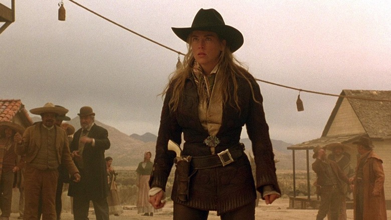 Ellen prepping for a shootout in The Quick and the Dead