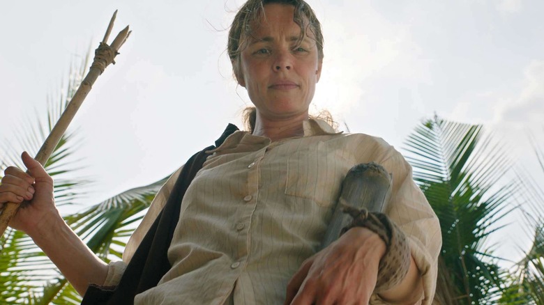 Linda Liddle standing with a spear in Send Help