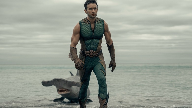 Chace Crawford as The Deep with Xander the shark behind him in The Boys