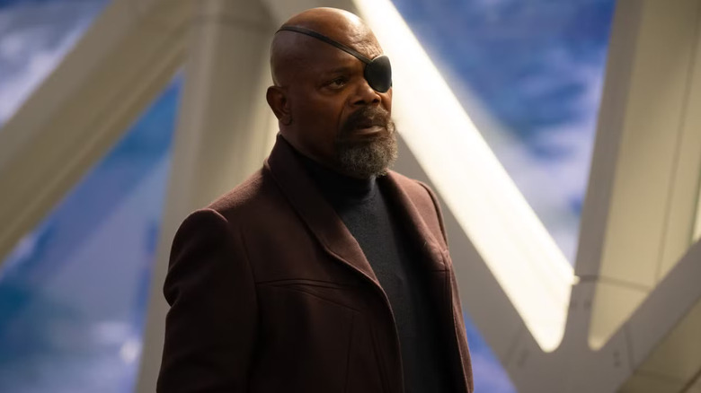 Nick Fury by a window in The Marvels