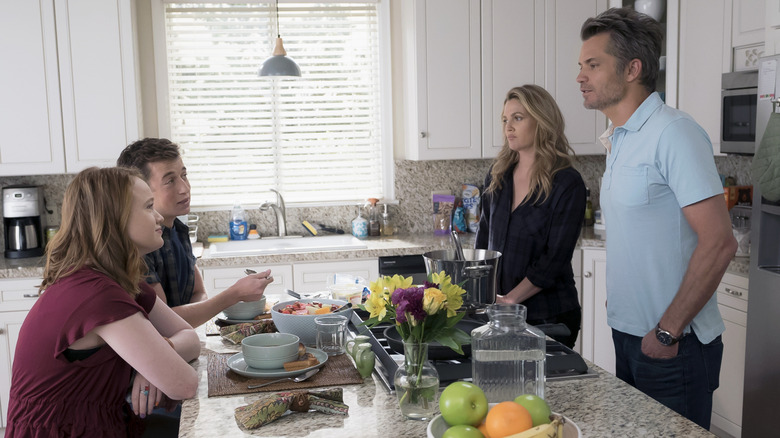 The Hammond family and Eric talking