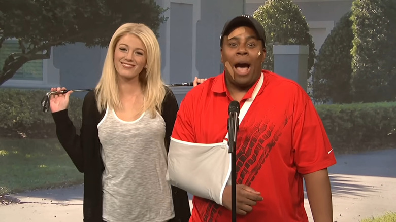 Tiger Woods (Kenan Thompson) injured next to Elin Nordegren (Blake Lively) on Saturday Night Live