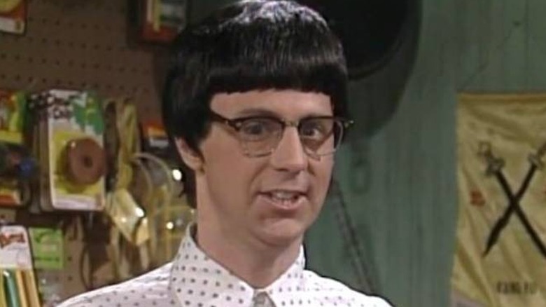 Ching Chang (Dana Carvey) smiling on Saturday Night Live