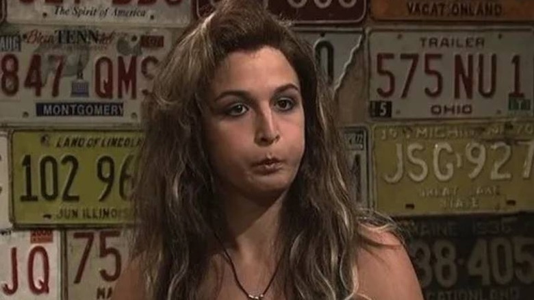 Jenny Slate blowing up cheeks on Saturday Night Live