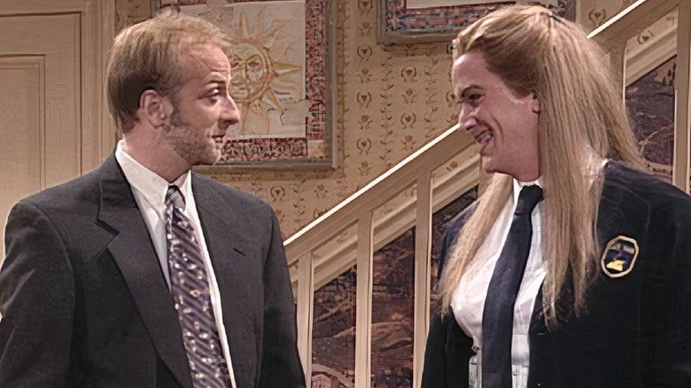 Dr. Henderson (Chris Elliot) with the babysitter (Mark McKinney) on Saturday Night Live