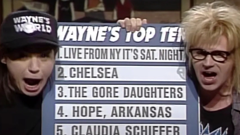 Wayne (Mike Myers) and Garth (Dana Carvey) holding a top ten list on Saturday Night Live