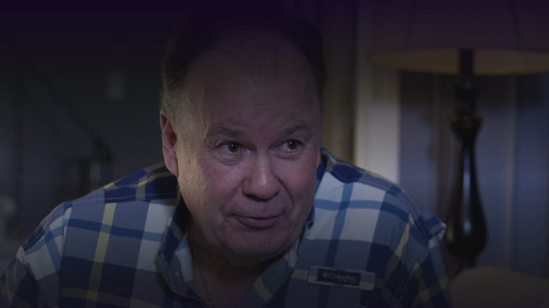 Dennis Haskins as Sam Bennett sitting in a living room in A Bennett Song Holiday