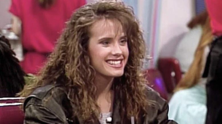 Leanna Creel as Tori Scott smiling at The Max in Saved by the Bell