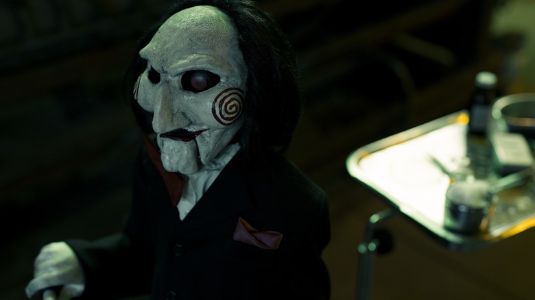 Saw X, Billy the puppet