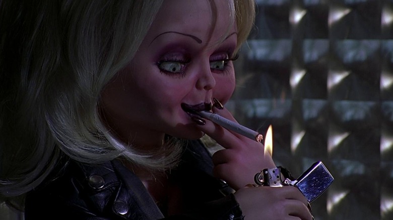 Tiffany lighting a cigarette in Bride of Chucky