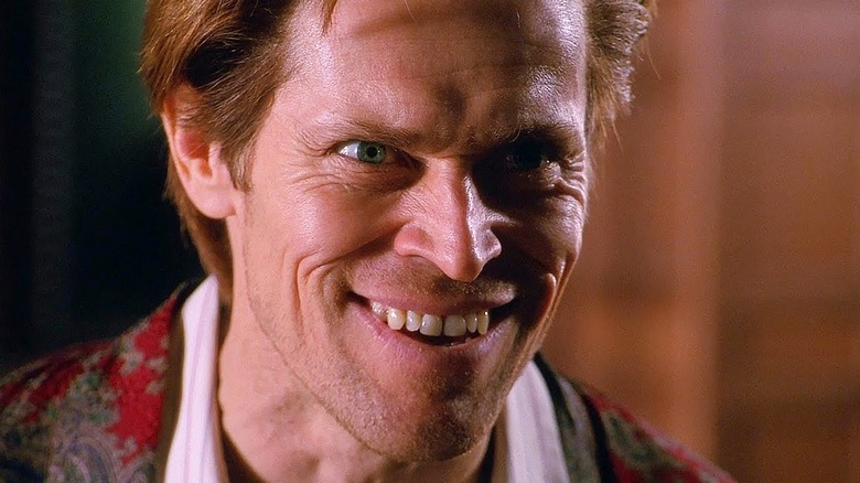 Norman Osborn smiling in the creepiest way possible in Spider-Man
